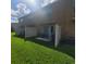 Private backyard with a small patio area at 10850 Lake Saint Charles Blvd, Riverview, FL 33578