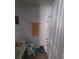 Bathroom features a single sink vanity and a dinosaur-themed shower curtain at 10850 Lake Saint Charles Blvd, Riverview, FL 33578