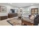 Comfortable living room features a large TV and cozy seating area at 1116 Hillandale Reserve Dr, Tampa, FL 33613
