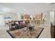 Open-concept living room with seating area and access to kitchen at 1116 Hillandale Reserve Dr, Tampa, FL 33613