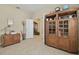 Office with built in wooden shelving units and neutral walls at 1116 Hillandale Reserve Dr, Tampa, FL 33613