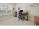 Bright office with neutral walls, tile floors, and an oversized window with plantation shutters at 1116 Hillandale Reserve Dr, Tampa, FL 33613
