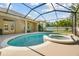 Screened-in pool and spa with a spacious deck for outdoor entertaining and lounging at 1116 Hillandale Reserve Dr, Tampa, FL 33613
