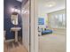 View of the powder room and doorway leading into another bedroom at 1116 Hillandale Reserve Dr, Tampa, FL 33613