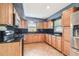 Well-appointed kitchen with granite countertops, stainless steel appliances, and ample cabinetry, perfect for cooking and entertaining at 11250 108Th Ln, Largo, FL 33778