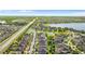 Picture of community featuring beautiful homes and a lake, with a location pin on a roof at 11419 Emerald Shore Dr, Riverview, FL 33579