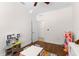 The bedroom features a table with chairs and multiple storage units with toys at 11419 Emerald Shore Dr, Riverview, FL 33579