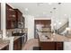 Spacious kitchen with granite countertops, stainless steel appliances and modern tile backsplash at 11419 Emerald Shore Dr, Riverview, FL 33579