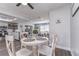Bright dining area connects seamlessly to the kitchen and living spaces at 11520 Bear Paw Ln, Port Richey, FL 34668