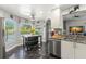 Bright kitchen with an island, stainless steel dishwasher, and lots of natural light at 1213 Barmere Ln, Brandon, FL 33511