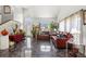 Bright living room with tall ceilings, staircase, and elegant tile floors, showcasing a welcoming ambiance at 1213 Barmere Ln, Brandon, FL 33511