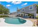 Private swimming pool with a landscaped backyard and home exterior view at 1213 Barmere Ln, Brandon, FL 33511