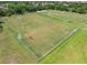 Aerial view of a community soccer field with lights at 1213 Barmere Ln, Brandon, FL 33511