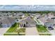 An aerial view of a single Gathering home nestled within a well-maintained neighborhood at 12420 Brick Cobblestone Dr, Riverview, FL 33579