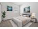 Bedroom with neutral-tone decor, plush bedding and side tables with lamps at 12420 Brick Cobblestone Dr, Riverview, FL 33579