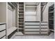 A spacious closet with shelves and drawers provides ample storage space at 12420 Brick Cobblestone Dr, Riverview, FL 33579