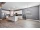 A kitchen featuring stainless steel appliances, an island, and plenty of room for a dining table at 12420 Brick Cobblestone Dr, Riverview, FL 33579