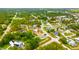 An aerial view showing a house with a large yard in a neighborhood at 13216 Antelope St, Spring Hill, FL 34609