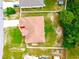An overhead shot shows the house, driveway, and the surrounding yard at 13216 Antelope St, Spring Hill, FL 34609