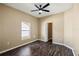 Bedroom featuring a ceiling fan, closet, and bright window for ample natural light at 13216 Antelope St, Spring Hill, FL 34609