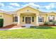 Charming single-Gathering home featuring a well-manicured lawn and inviting front porch at 13216 Antelope St, Spring Hill, FL 34609