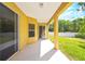 Covered outdoor patio offering access to the yard with lots of natural light at 13216 Antelope St, Spring Hill, FL 34609