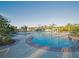 Luxurious community pool with expansive deck area, perfect for relaxation and recreation at 13752 Tensaw Dr, Hudson, FL 34669