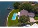 Lovely home with pristine pool, and private dock, situated on picturesque waterfront property at 218 Colony Point S Rd, St Petersburg, FL 33705