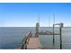 Private dock featuring boat lift and water access with beautiful views at 218 Colony Point S Rd, St Petersburg, FL 33705