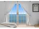 Stunning ocean view visible through large double doors, inviting the outdoors inside at 218 Colony Point S Rd, St Petersburg, FL 33705