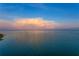 Breathtaking view of calm waters and a vibrant sunset at 218 Colony Point S Rd, St Petersburg, FL 33705