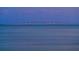 Long exposure of a beautiful, illuminated bridge stretching over calm waters at 218 Colony Point S Rd, St Petersburg, FL 33705
