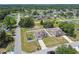Real estate aerial view showcasing neighborhood and the two homes on the street at 27050 Anthony Ave, Brooksville, FL 34602
