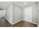Hallway featuring modern flooring and neutral paint at 27050 Anthony Ave, Brooksville, FL 34602