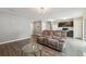 Spacious living area featuring an open floor plan and neutral decor at 27050 Anthony Ave, Brooksville, FL 34602