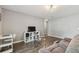 Comfortable living room featuring modern flooring and views into another room at 27050 Anthony Ave, Brooksville, FL 34602
