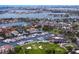 Breathtaking aerial view of a marina, golf course, and waterfront community, offering luxurious living and recreational opportunities at 2773 Seabreeze S Dr, Gulfport, FL 33707