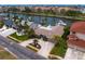 Aerial view of waterfront homes with boat docks along a canal on a sunny day at 2773 Seabreeze S Dr, Gulfport, FL 33707