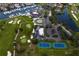 Aerial shot showcasing a golf course, marina, tennis courts and beautiful landscaping, ideal for leisure and recreation at 2773 Seabreeze S Dr, Gulfport, FL 33707