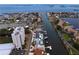 Incredible aerial perspective of waterfront homes and condominiums, complete with private boat docks and serene waterways at 2773 Seabreeze S Dr, Gulfport, FL 33707
