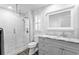 Beautiful bathroom with shower and granite top vanity at 2773 Seabreeze S Dr, Gulfport, FL 33707