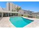 Backyard pool area with outdoor seating at 2773 Seabreeze S Dr, Gulfport, FL 33707