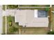Aerial view highlighting the home's layout and fully fenced yard with mature landscaping at 2807 Northcote Dr, Palm Harbor, FL 34684