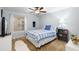 Cozy bedroom featuring a ceiling fan and a window that provides natural light at 2807 Northcote Dr, Palm Harbor, FL 34684