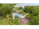 Beautiful community pool and playground surrounded by palm trees, offering a relaxing atmosphere at 2807 Northcote Dr, Palm Harbor, FL 34684