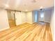 Spacious basement with new flooring and access to other rooms at 3143 Phoenix Ave, Oldsmar, FL 34677