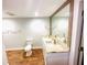 Bathroom with double sinks, granite countertops and a large mirror at 3143 Phoenix Ave, Oldsmar, FL 34677