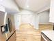 Bright dining area with wood floors adjacent to the kitchen at 3143 Phoenix Ave, Oldsmar, FL 34677