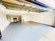 This large, freshly painted garage has epoxy floors and ample storage at 3143 Phoenix Ave, Oldsmar, FL 34677