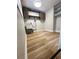The laundry room features a utility sink, cabinets, and new flooring at 3143 Phoenix Ave, Oldsmar, FL 34677